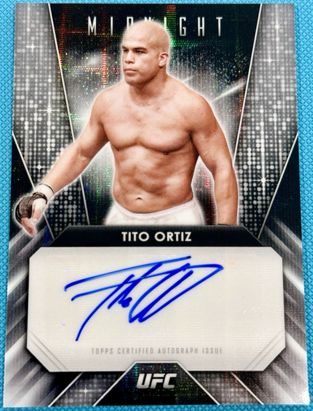 Tito Ortiz 2024 Topps Midnight UFC Glimmer Graphs #GG-TOZ Black Light