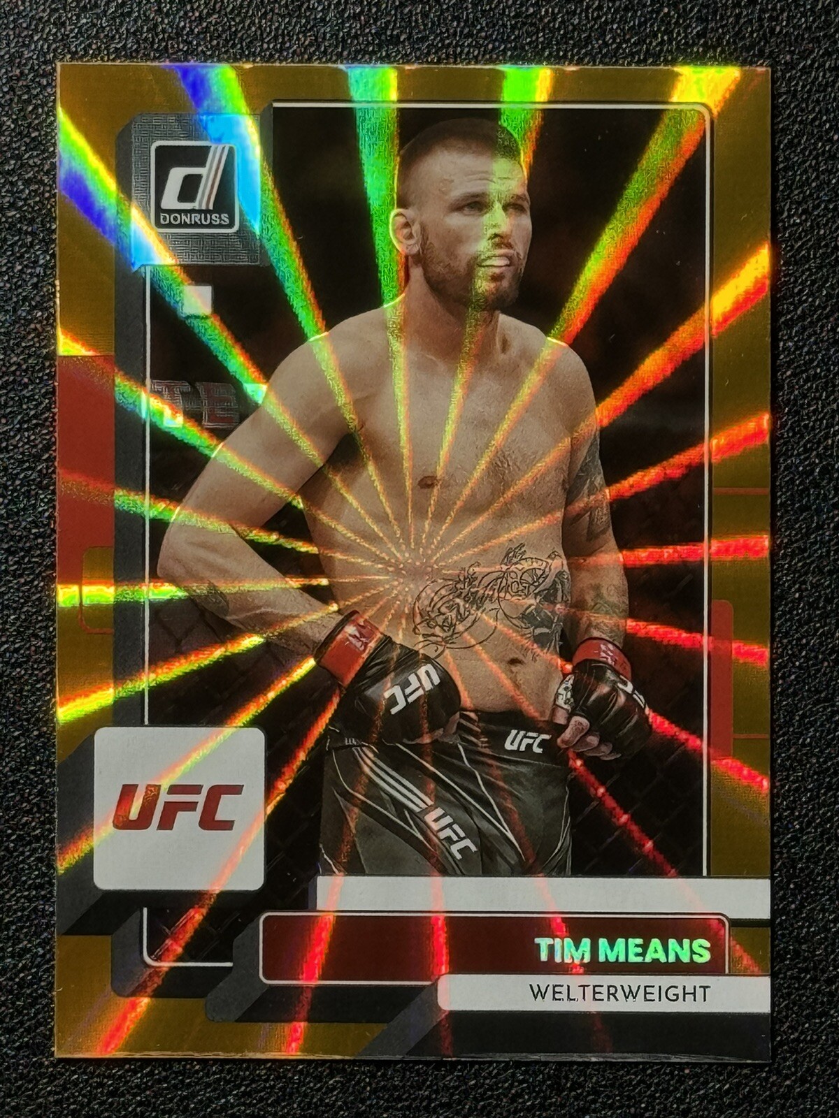 Tim Means 2023 Panini Donruss UFC Base #1 Orange Laser