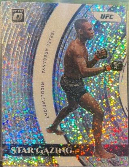 Israel Adesanya 2022 Panini Donruss Optic UFC Star Gazing #24 White Sparkle