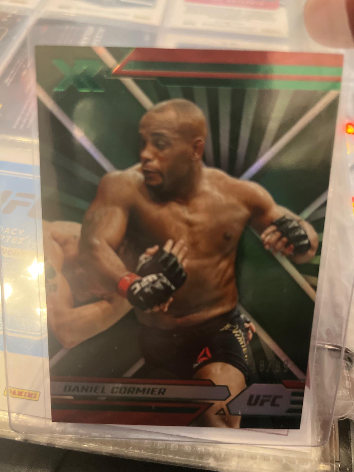 Daniel Cormier 2022 Panini Chronicles UFC Base XR #291 Green