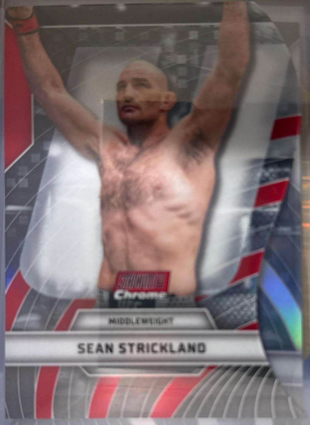 Sean Strickland 2026 Topps Stadium Club UFC Triumvirates #TV-43 Red Refractor