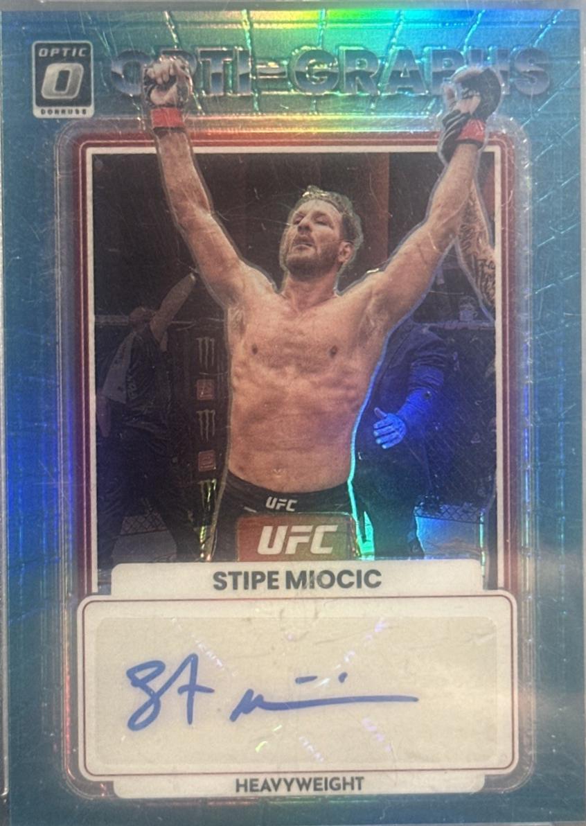 Stipe Miocic 2023 Panini Donruss Optic UFC Opti-Graphs #39 Teal Autograph