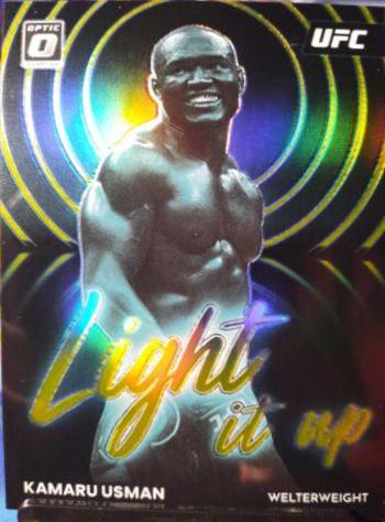 Kamaru Usman 2023 Panini Donruss Optic UFC Light It Up #12 Gold