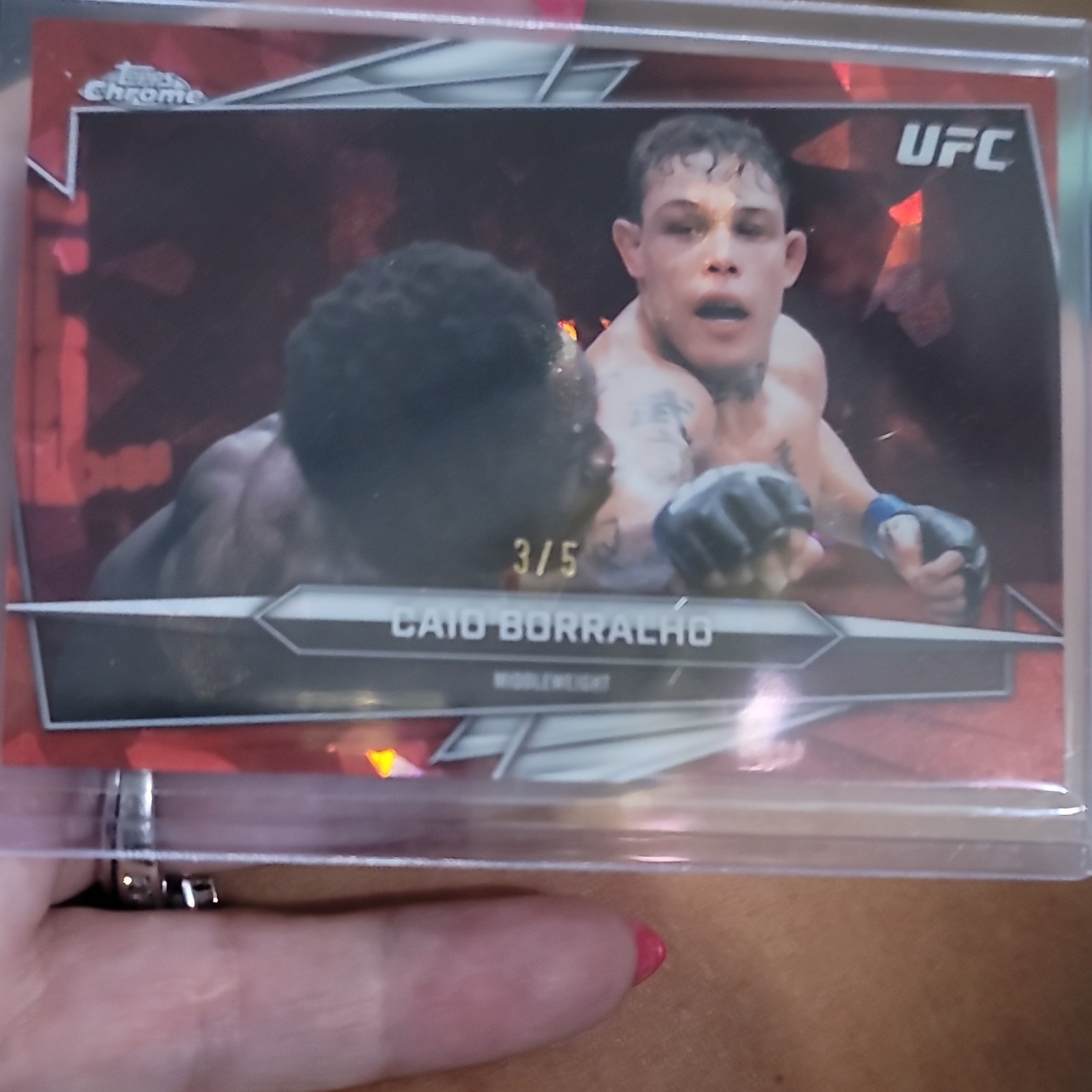 Caio Borralho 2026 Topps Chrome UFC Base #76 Orange Ray Wave Refractor