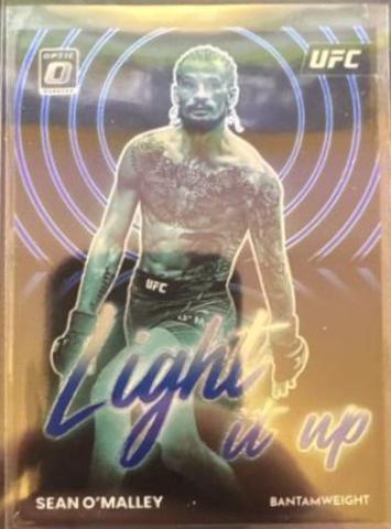 Sean O'Malley 2023 Panini Donruss Optic UFC Light It Up #8 Blue