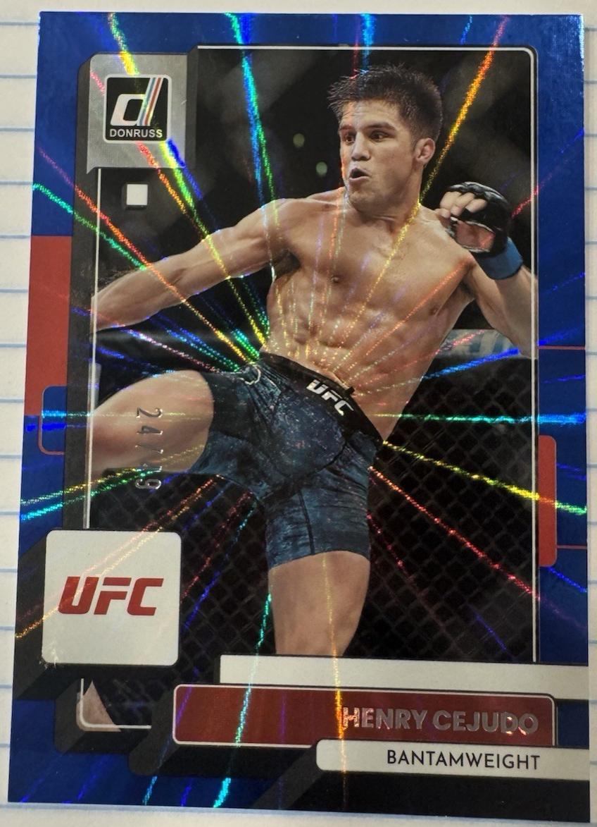 Henry Cejudo 2023 Panini Donruss UFC Base #63 Blue Laser