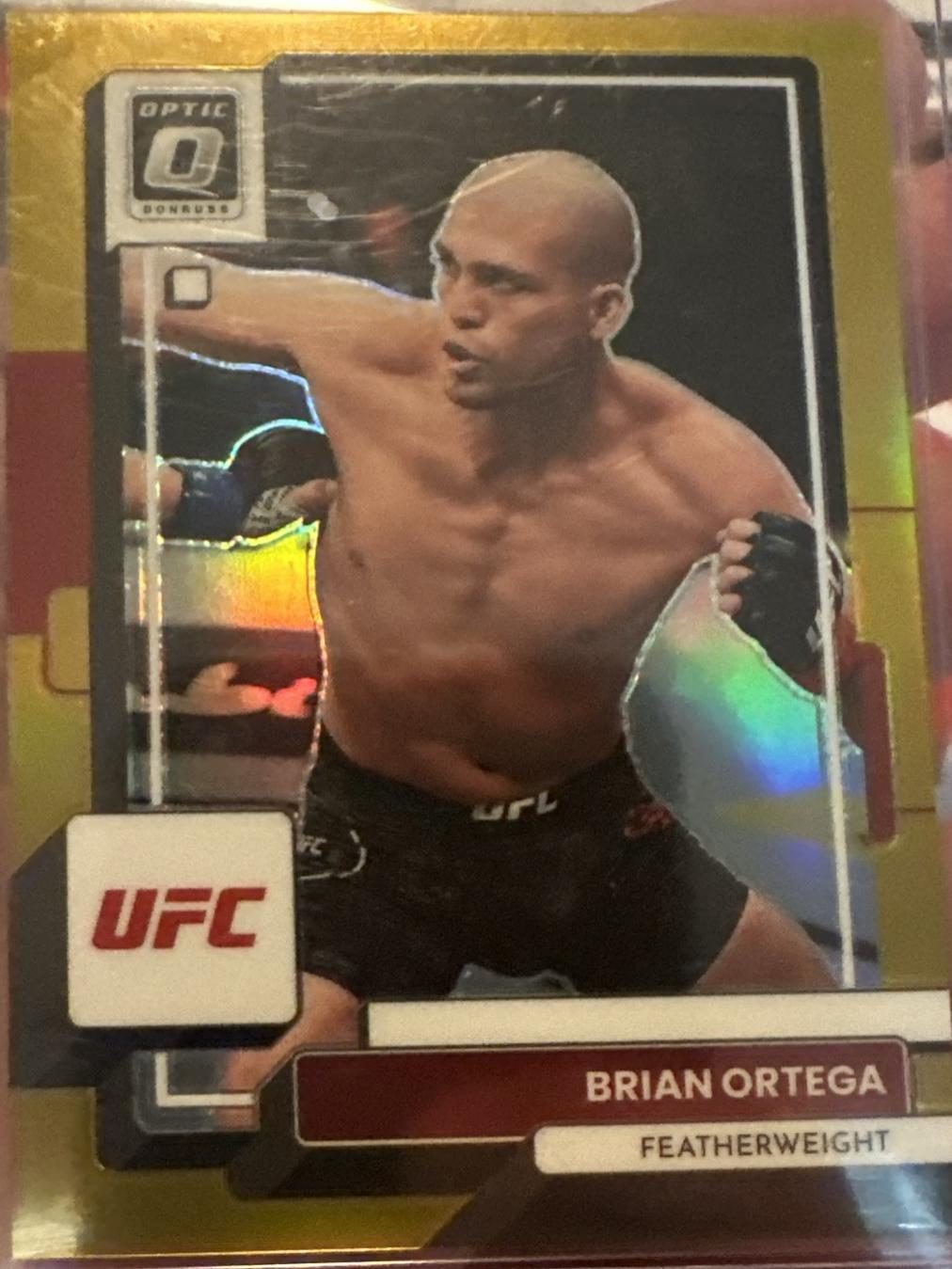 Brian Ortega 2023 Panini Donruss Optic UFC Base #31 Gold