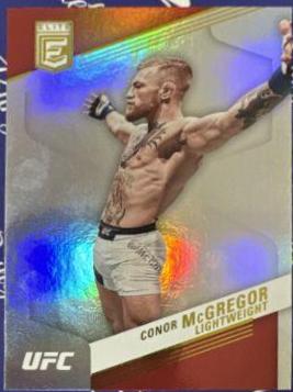Conor McGregor 2023 Panini Chronicles UFC Base Elite #245 Orange