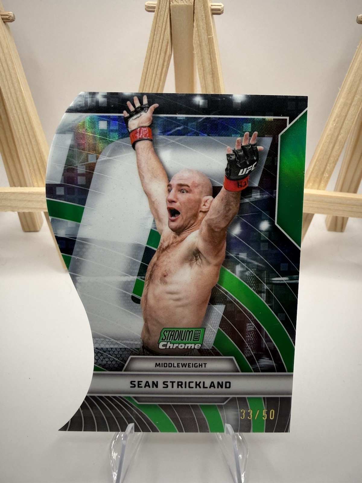 Sean Strickland 2026 Topps Stadium Club UFC Triumvirates #TV-45 Red Refractor