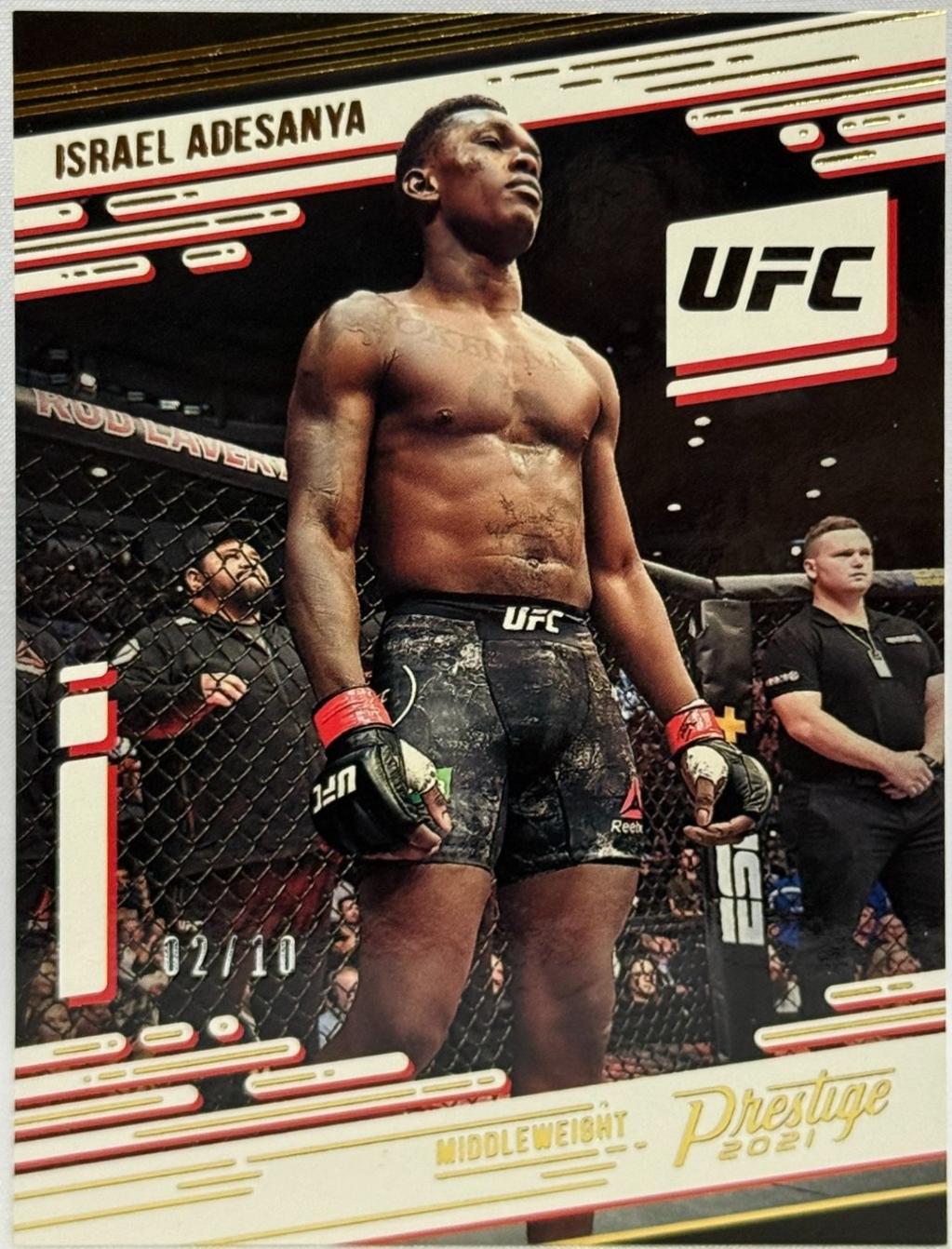 Israel Adesanya 2021 Panini Chronicles UFC Base Prestige #71 Gold