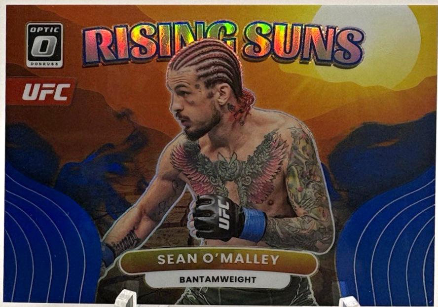 Sean O'Malley 2023 Panini Donruss Optic UFC Rising Suns #18 Blue