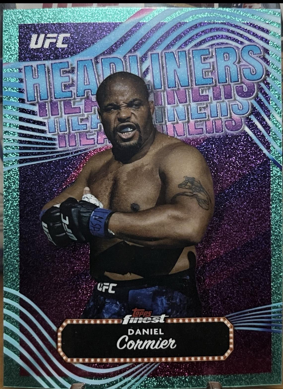 Daniel Cormier 2024 Topps Finest UFC Headliners #HDL-22 Aqua Glitter Refractor
