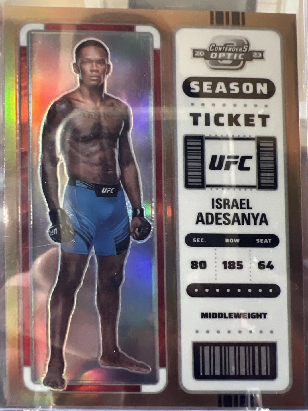 Israel Adesanya 2023 Panini Chronicles UFC Base Contenders Optic Season Ticket #353 Bronze