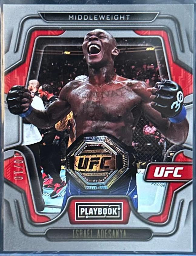 Israel Adesanya 2023 Panini Chronicles UFC Base Playbook #112 Gold