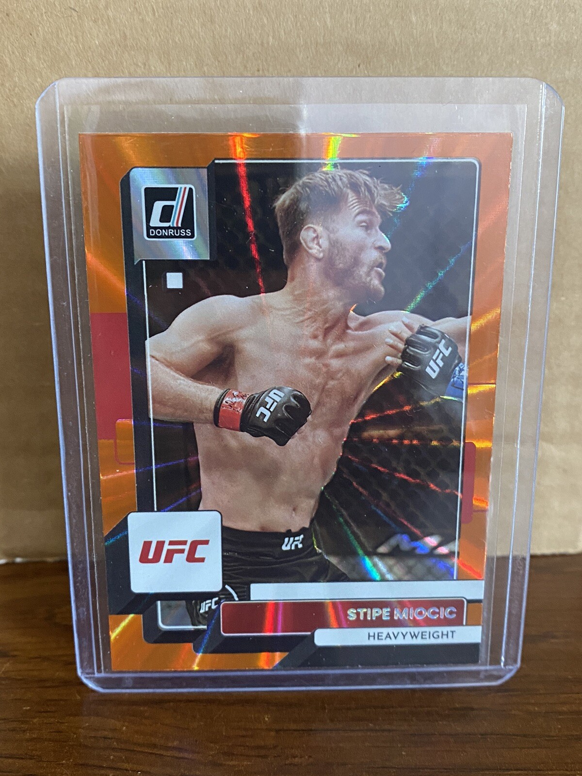 Stipe Miocic 2023 Panini Donruss UFC Base #149 Orange Laser