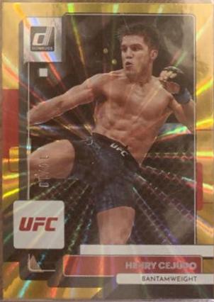 Henry Cejudo 2023 Panini Donruss UFC Base #63 Gold Laser