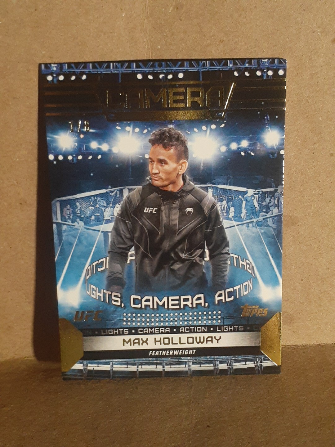 Max Holloway 2024 Topps Knockout UFC Camera (Lights, Camera, Action) #CAM-2 Gold