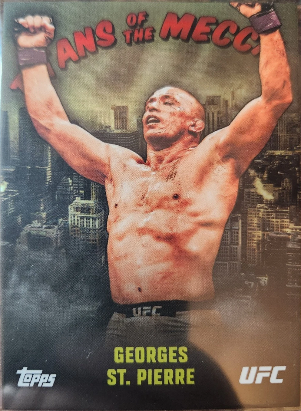 Georges St-Pierre 2024 Topps UFC NYC Titans of the Mecca #TM-2 Orange