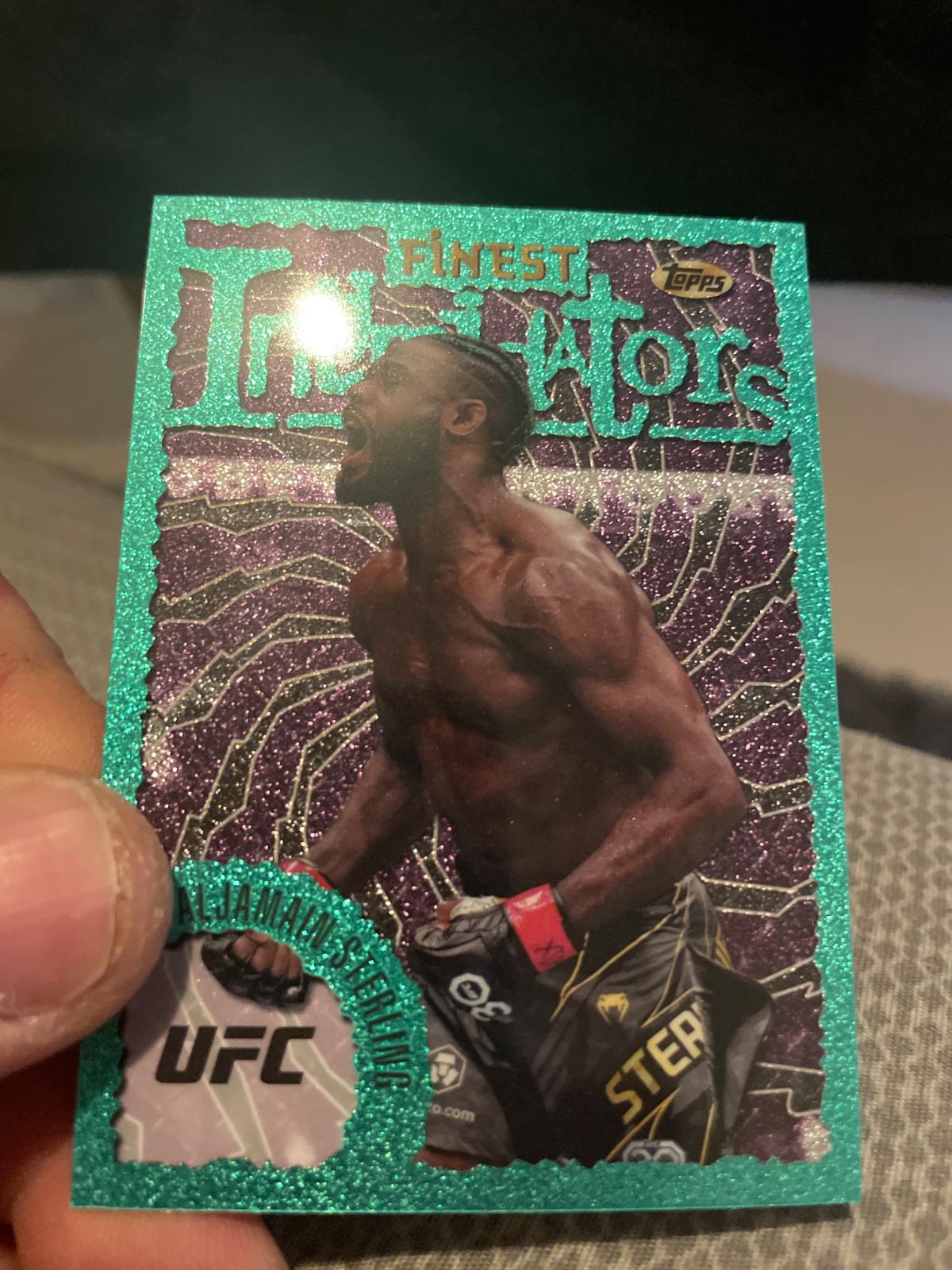 Aljamain Sterling 2024 Topps Finest UFC Intimidators #INT-14 Aqua Glitter Refractor