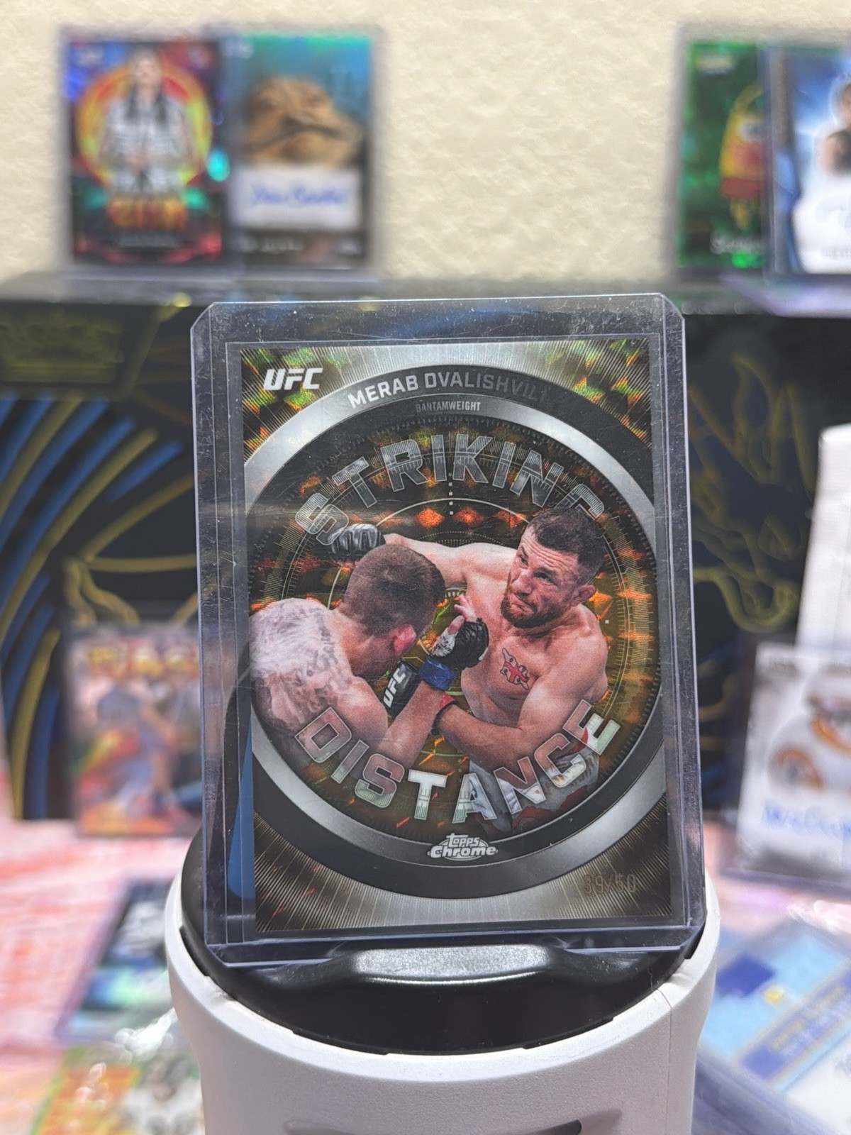 Merab Dvalishvili 2026 Topps Chrome UFC Striking Distance #SD-29 Gold Geometric Refractor