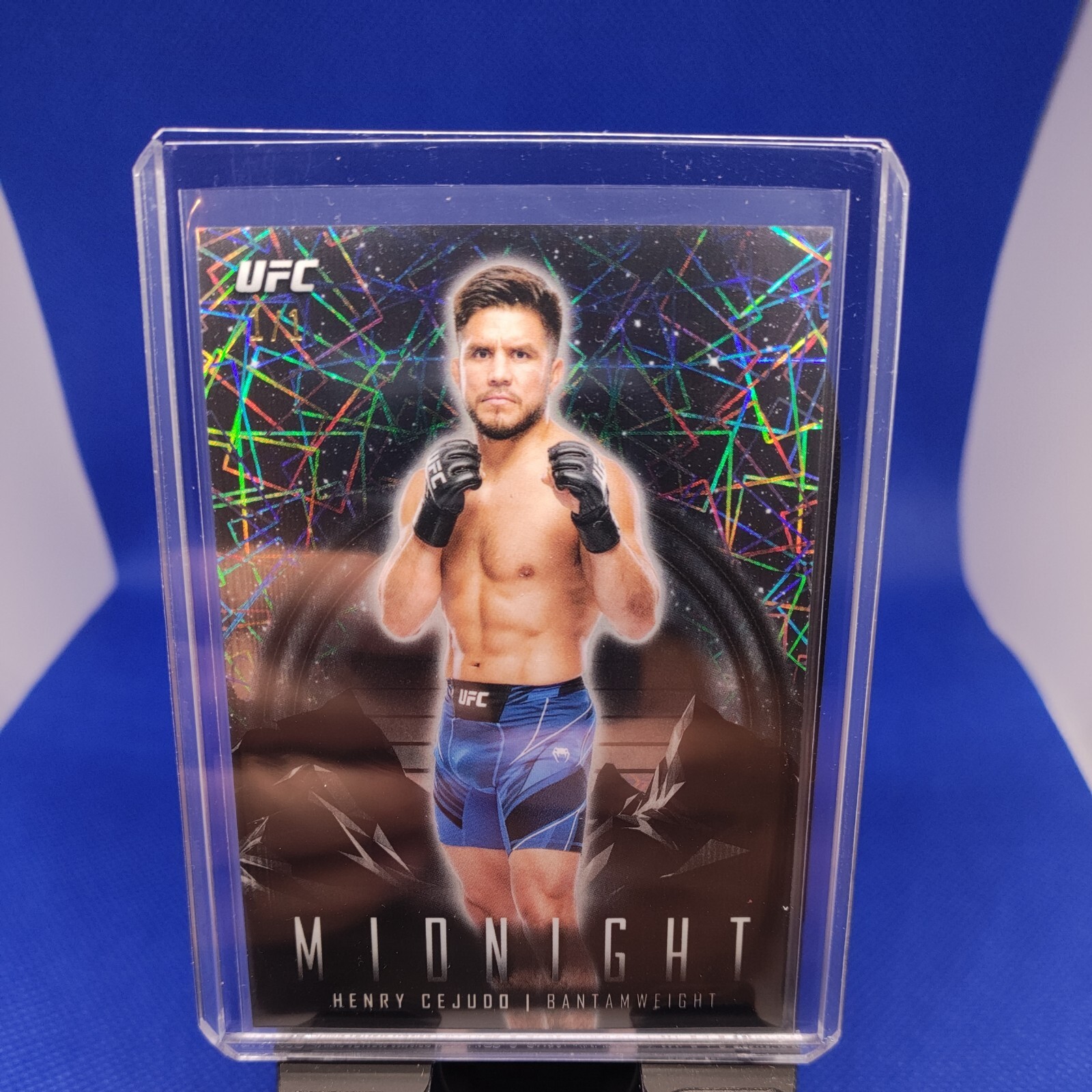 Henry Cejudo 2024 Topps Midnight UFC Base #23 Black Light