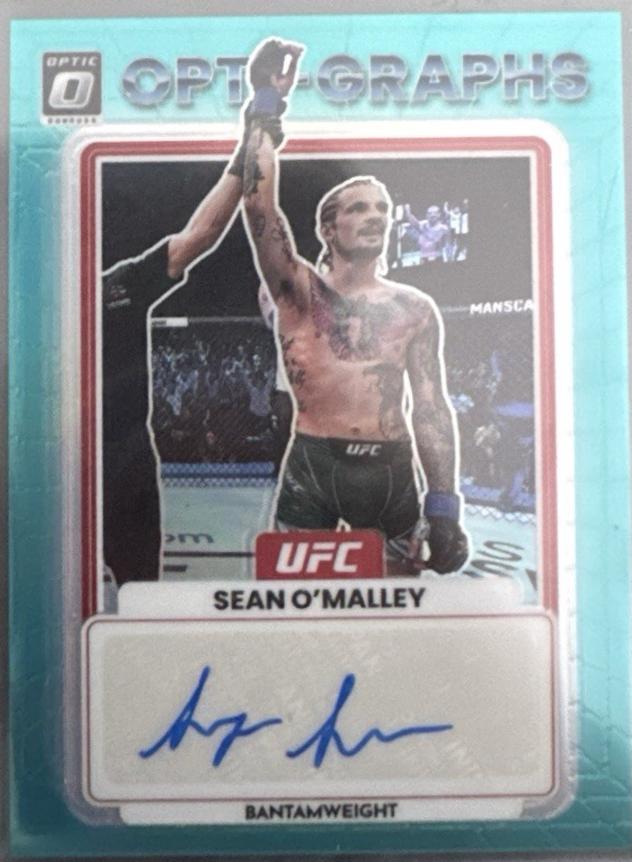 Sean O'Malley 2023 Panini Donruss Optic UFC Opti-Graphs #19 Teal Autograph
