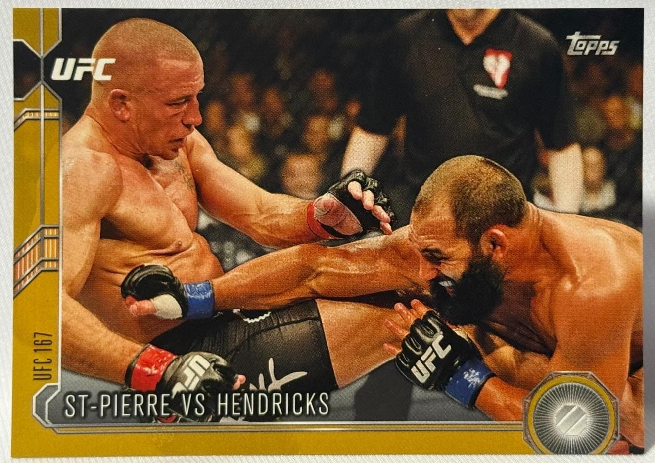 Georges St-Pierre / Johny Hendricks 2015 Topps UFC Chronicles Base #215 Red